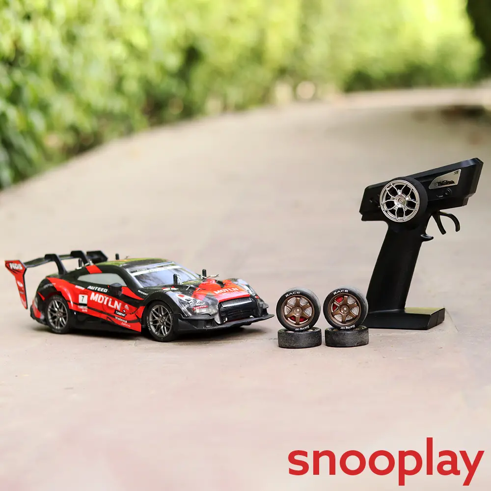 Remote Control 4X4 Drift Racing Car With 4 Spare Wheels - 2.4Ghz Frequency, Light & Sound | 1:16 Scale (5-12 Years) | Assorted Colors 1